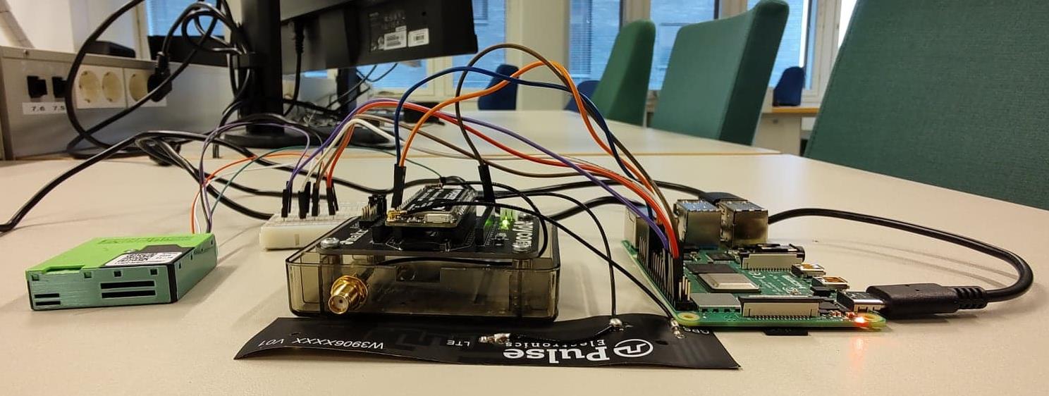 Sensirion SPS30 optical particulate matter sensor undergoing benchtop serial communication and calibration testing.